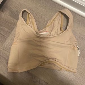 Tan under tech undercover size small holster. Like new. Never worn!!